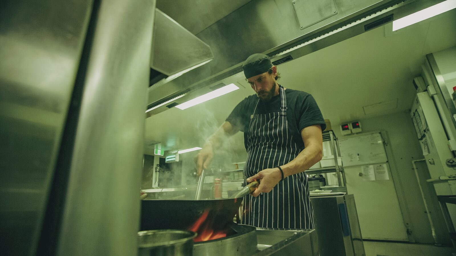 Hotel Monier chef cooking with a flaming wok